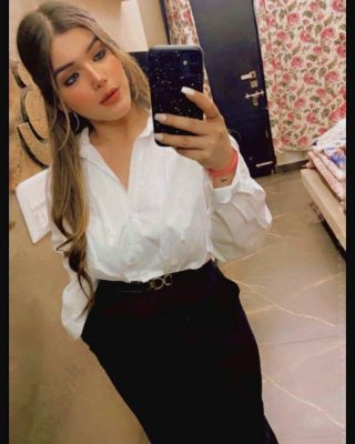 Beautiful escort model Riona: weight 61 kg, height 166 cm